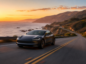 A sleek electric vehicle driving along a scenic California road at sunset, with hills, coastline, or desert views, warm golden light, realistic road trip photography